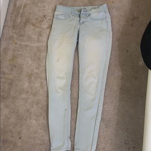 A pair of light-wash jegging